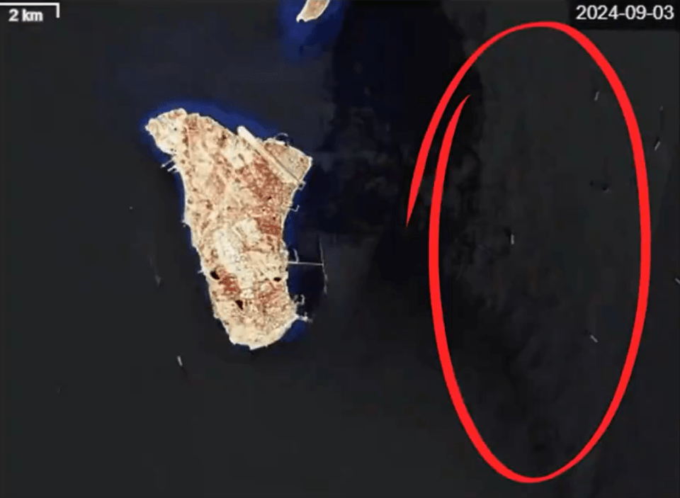 a black background with a red circle and the date 2024-10-03