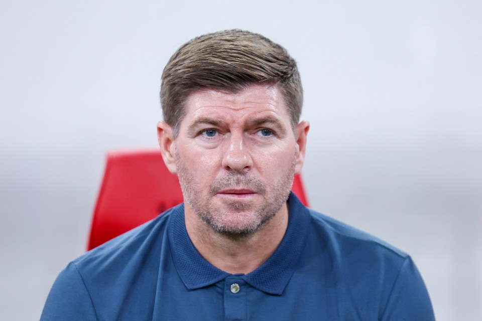 a man with a beard is wearing a blue shirt