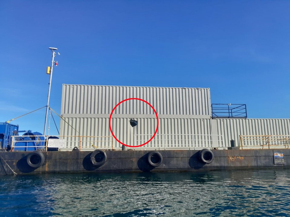 a large building with a red circle around it