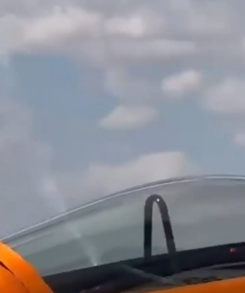 a close up of a car 's windshield with a blue sky in the background .