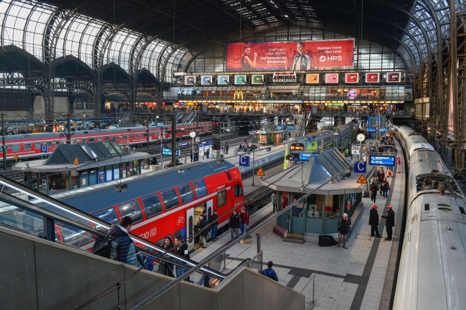 a train station with a sign that says hks on it
