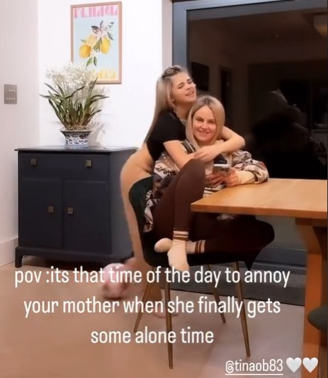 two women sitting at a table with the caption pov its that time of the day to annoy your mother when she finally gets some alone time