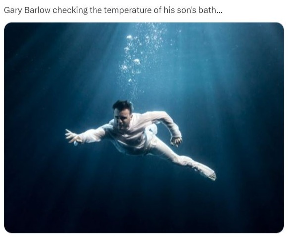 a tweet from marc wainwright shows a man swimming underwater
