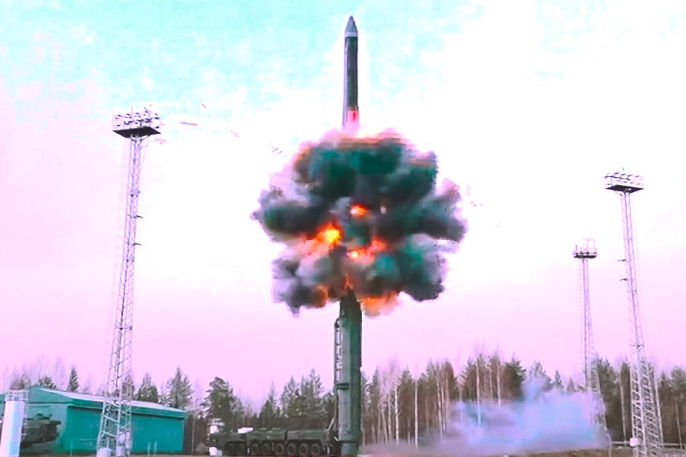 a rocket is being launched with the letter n on it