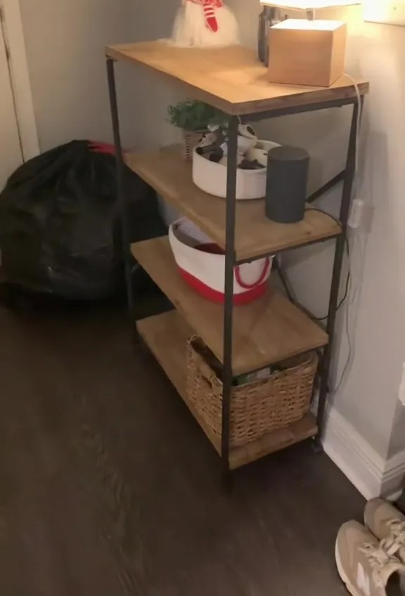 The couple use shelves to hold extra items