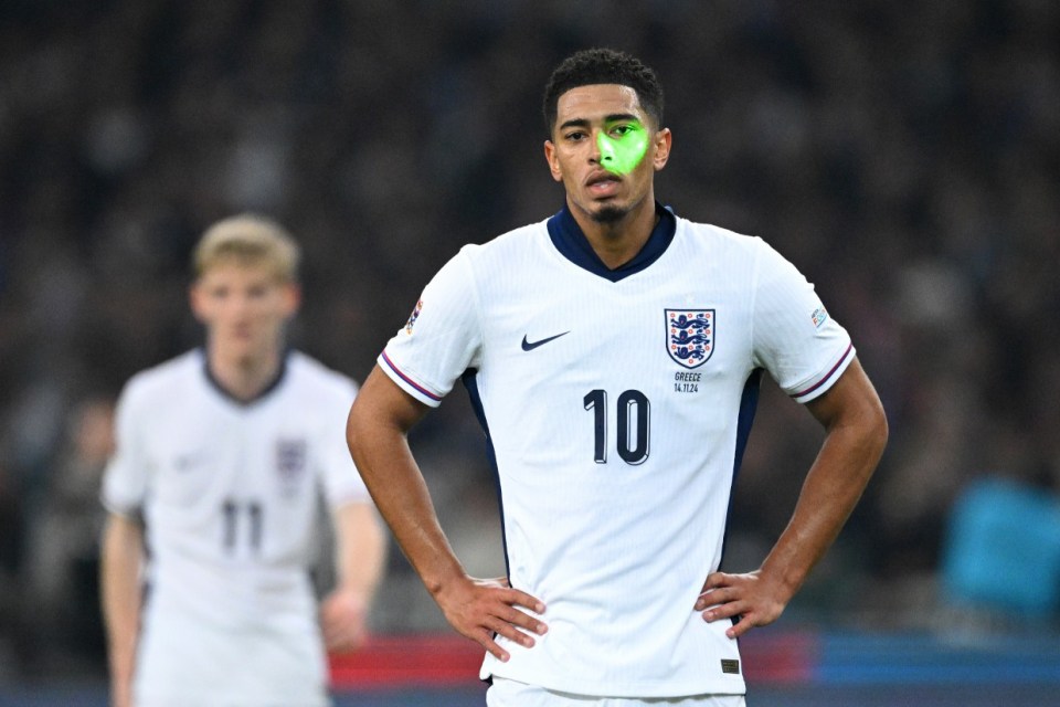 ATHENS, GREECE - NOVEMBER 14: Jude Bellingham of England looks on as a laser is shone towards him during the UEFA Nations League 2024/25 League B Group B2 match between Greece and England at Athens Olympic Stadium on November 14, 2024 in Athens, Greece. (Photo by Justin Setterfield/Getty Images)