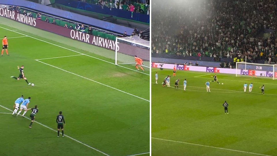 a soccer field with an ad for qatar airways