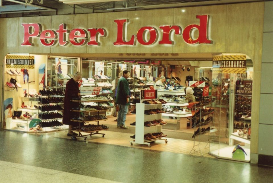 a shoe store called peter lord has a sign that says clearance