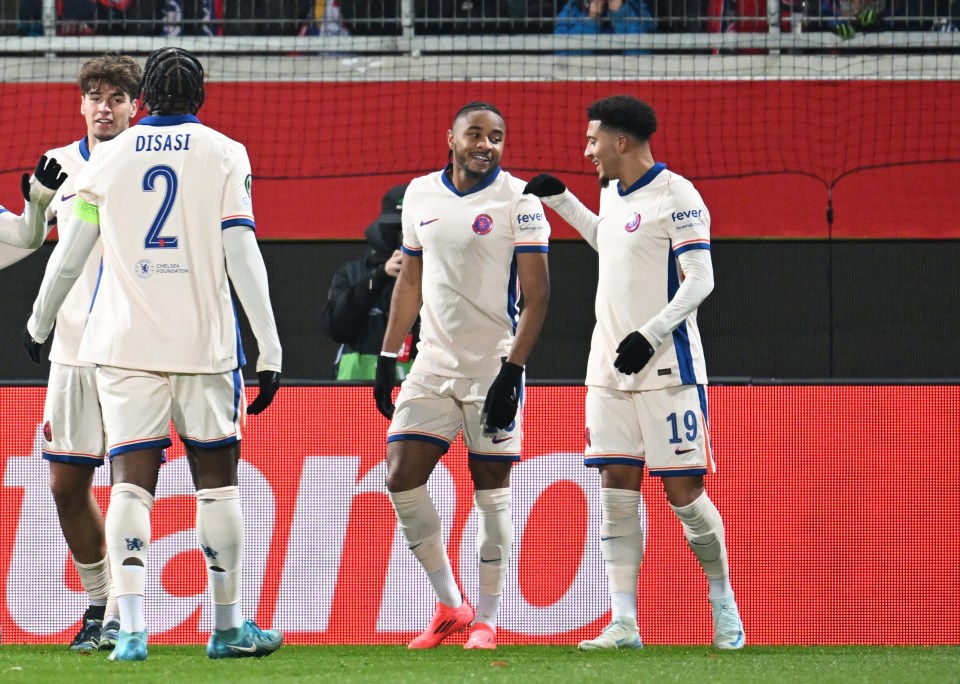 Soccer Football - Europa Conference League - 1. FC Heidenheim v Chelsea - Voith-Arena, Heidenheim, Germany - November 28, 2024 Chelsea's Christopher Nkunku celebrates scoring their first goal with Jadon Sancho REUTERS/Angelika Warmuth