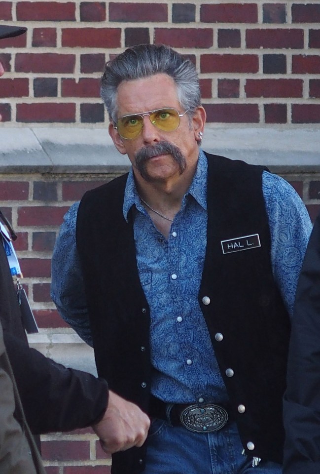 a man with a name tag that says hal on it