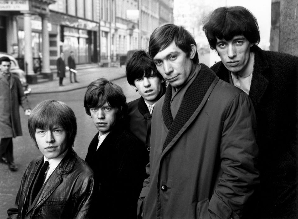 a black and white photo of the rolling stones