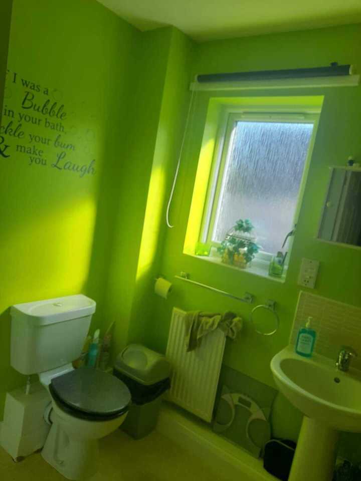 A mother has revealed that thanks to her husband, her lime green bathroom has been given a total overhaul