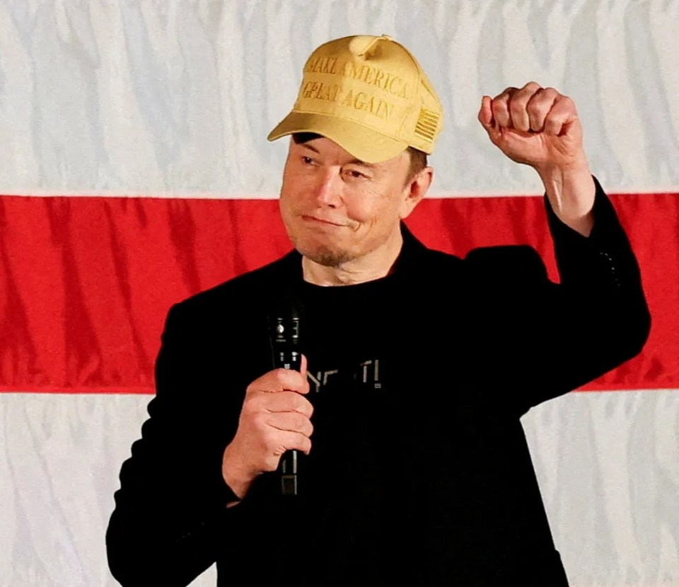 a man wearing a hat that says all america great again