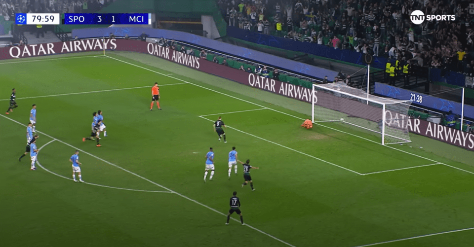 a soccer game is being played in front of a qatar airways banner
