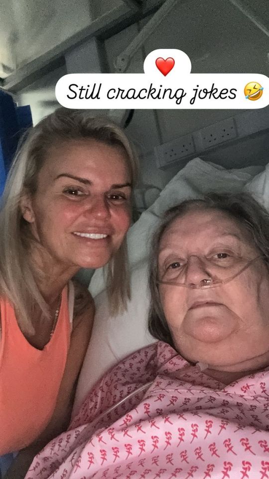 two women in a hospital bed with the caption still cracking jokes