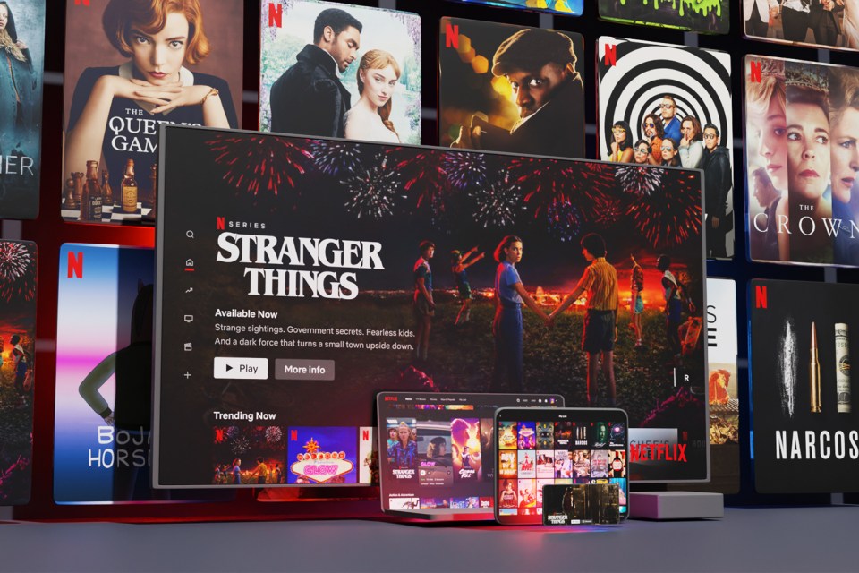 a netflix screen shows a stranger things advertisement