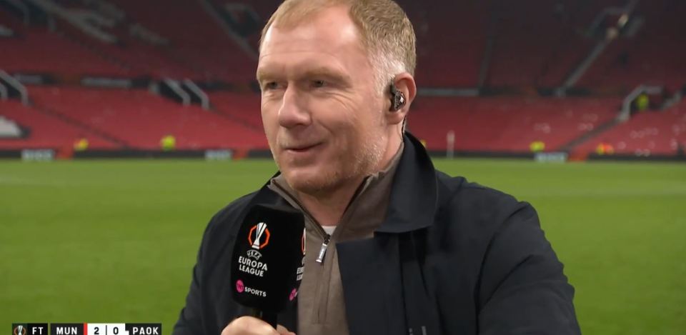 a man holding a microphone that says uefa european league