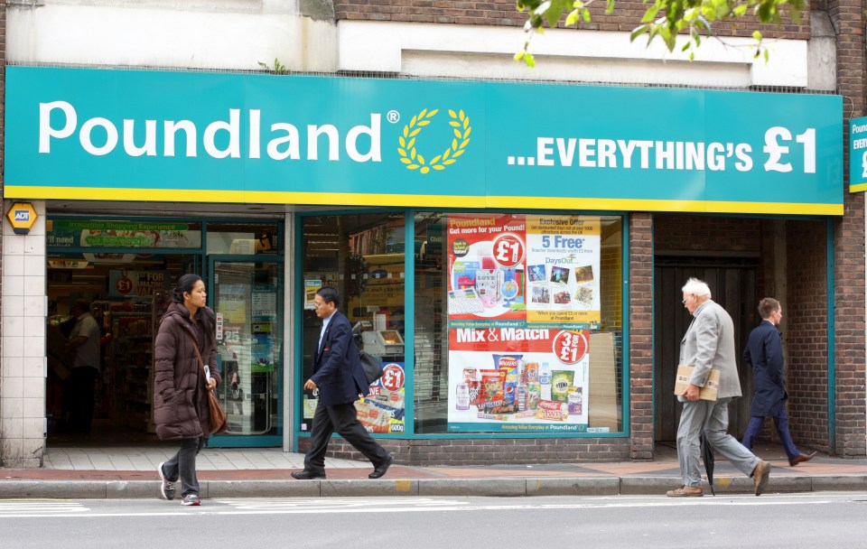people walking in front of a poundland store
