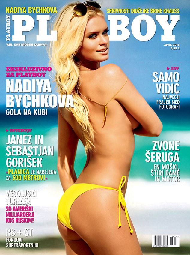 a woman in a yellow bikini is standing on the beach