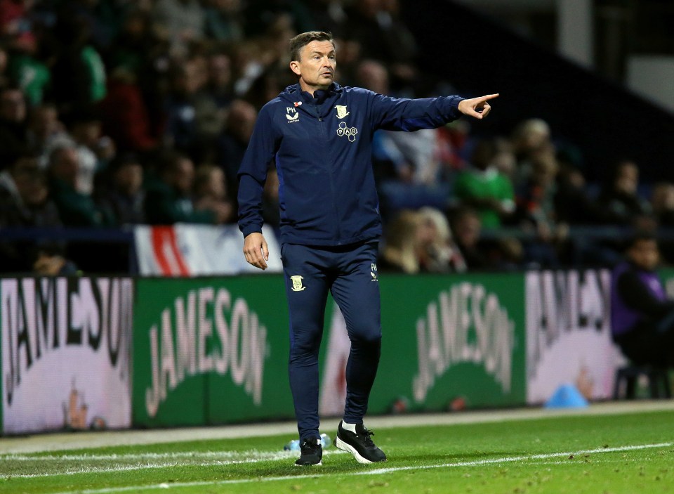 a man in a blue jacket with the word jameson on it