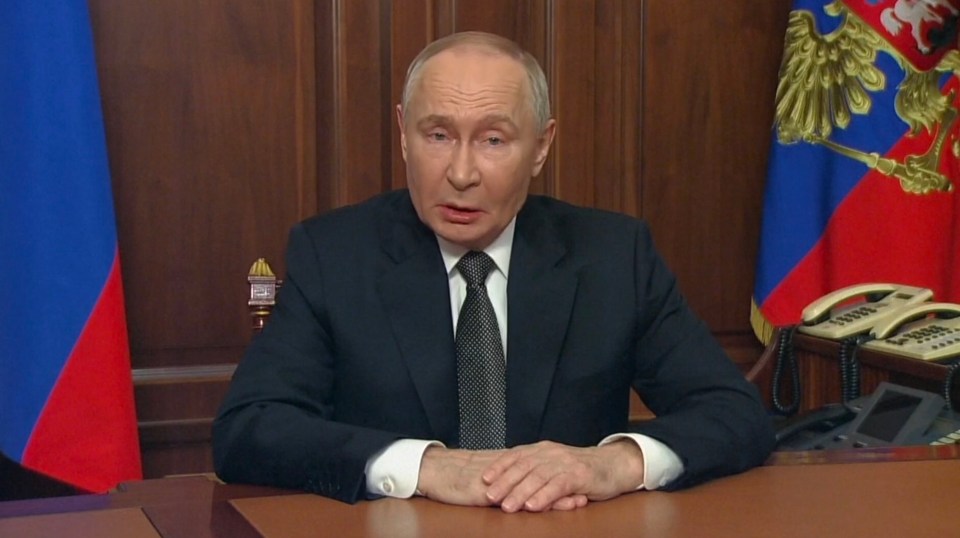Putin gurned and ranted - but his hands remained motionless