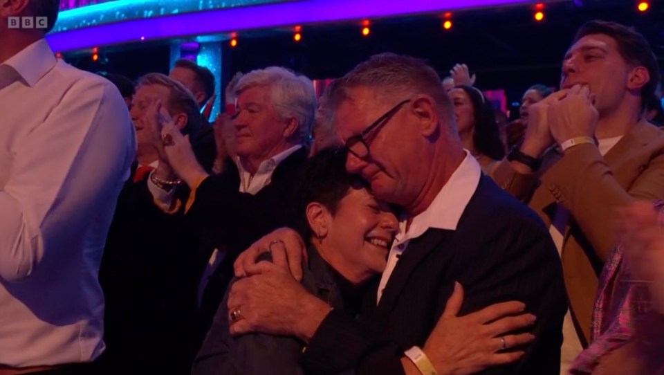 Rina and Mark comforted each other as the audience cheered Dianne on