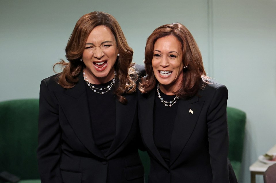 two women in black suits are making funny faces