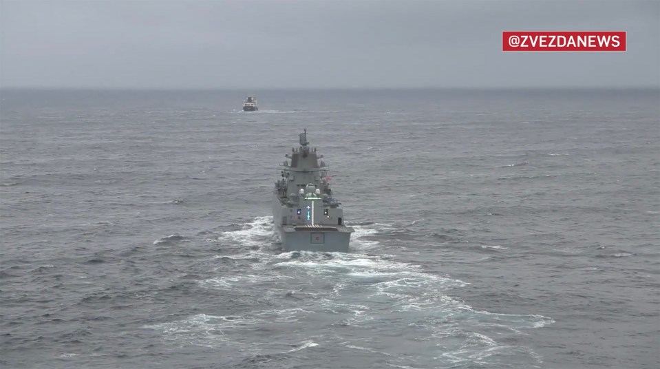 a large ship is in the middle of a large body of water