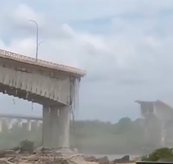 Bridge demolition in progress.
