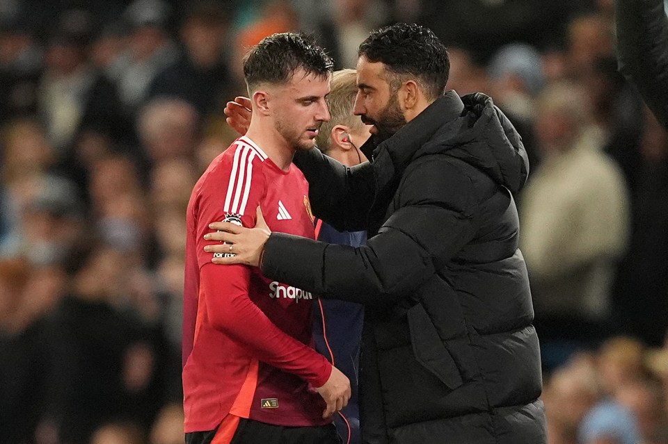 Mason Mount and his manager comforting each other.