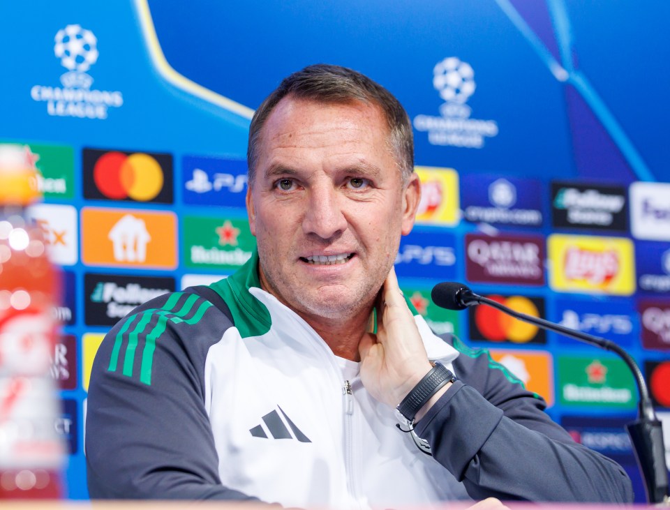 A press conference with doctors, Brendan Rogers is in the middle.