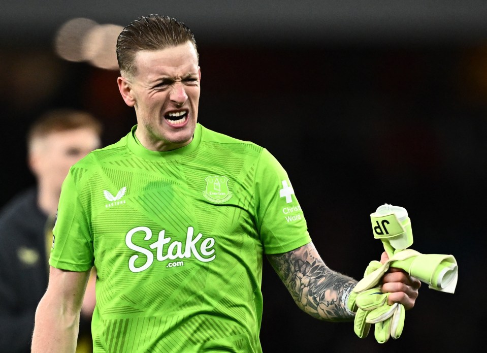 Jordan Pickford of Everton celebrates after a soccer match.