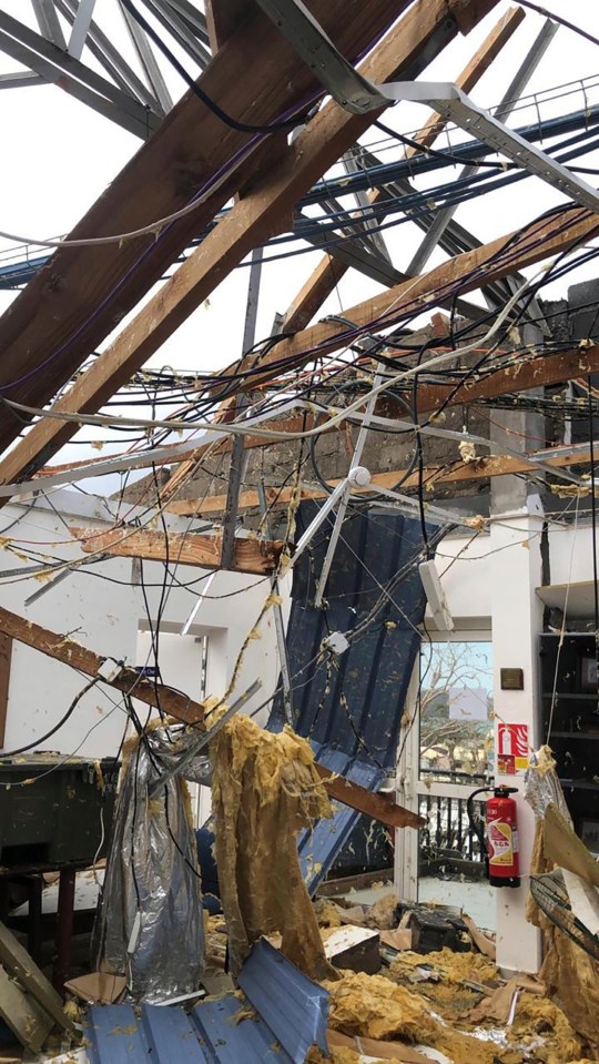 Damaged building interior after Cyclone Chido.