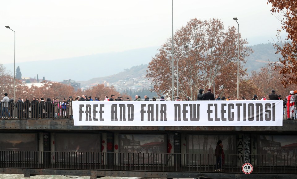 Protestors in Tbilisi demand free and fair new elections.