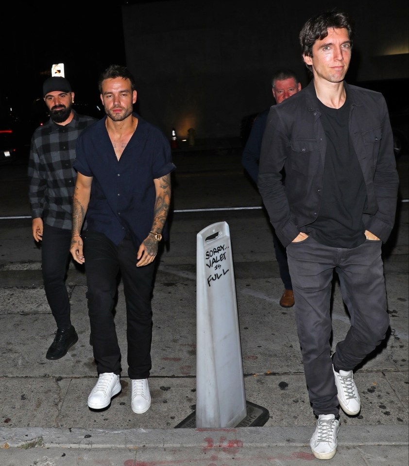 Liam Payne, his father, and a friend leaving Craig's restaurant in West Hollywood.