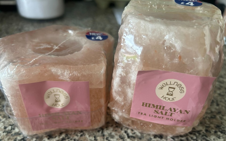 Two Himalayan salt tea light holders.