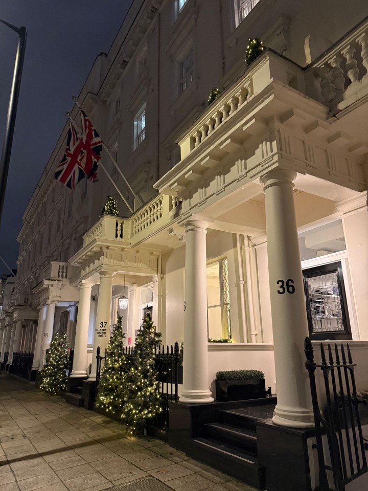 Night view of Eccleston Square Hotel, London, decorated for Christmas.