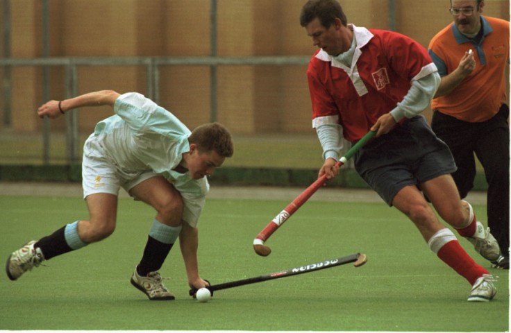 HOCKEY @ NATIONAL HOCKEY STADIUM,MILTON KEYNES. CAMBRIDGE UNIV. V THE ARMY. 19.2.97. TIMES PIC;HUGH ROUTLEDGE. (L) IAN BATEMAN(CAMB) TRIES TO TACKLE MAJ. P.BOXELL.