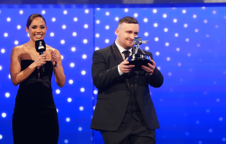 Luke Littler accepts the BBC Young Sports Personality of the Year award.