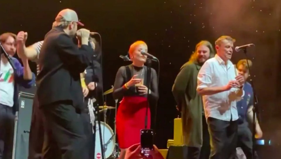 Grian Chatten singing "Streams of Whiskey" with The Pogues in Dublin.