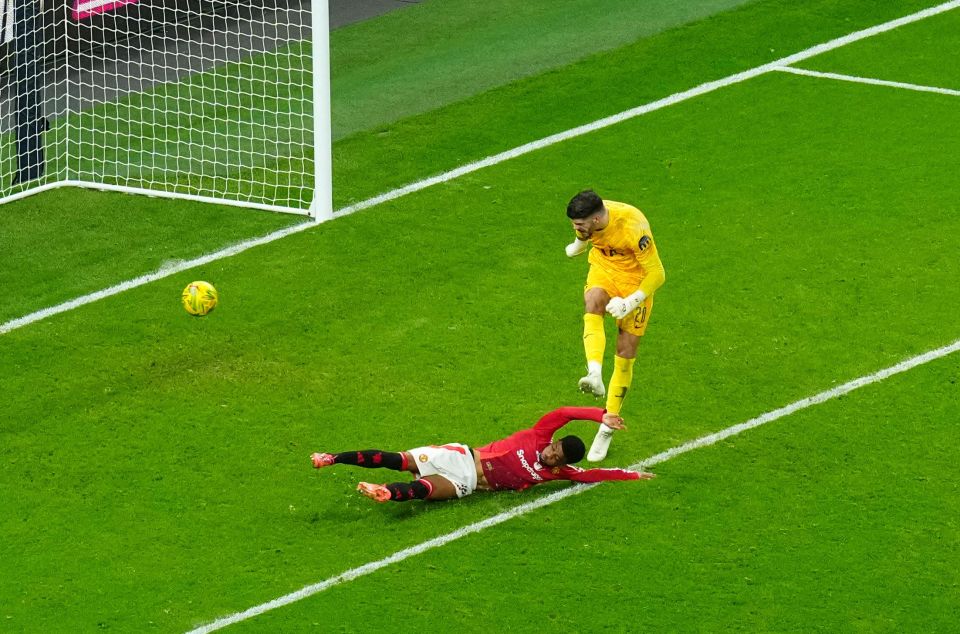 Amad Diallo of Manchester United deflects the ball into the net.