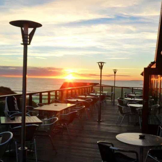 Beachside grill at sunset.