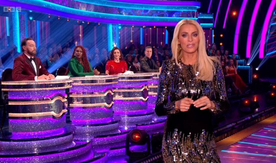 Strictly Come Dancing judges and host at the judging table.