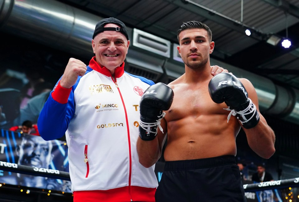Tommy Fury poses for a photo with his father.