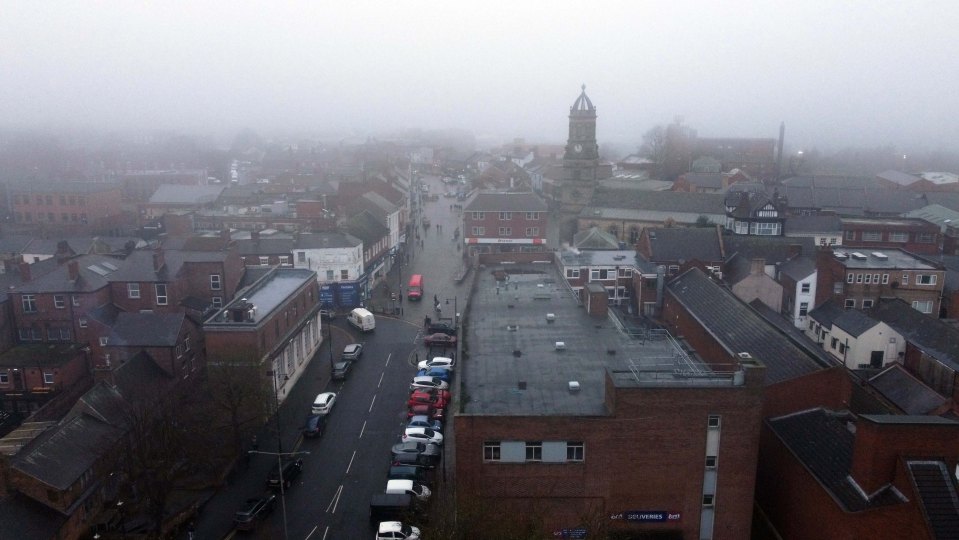 Aerial view of Pontefract town center on a foggy day.