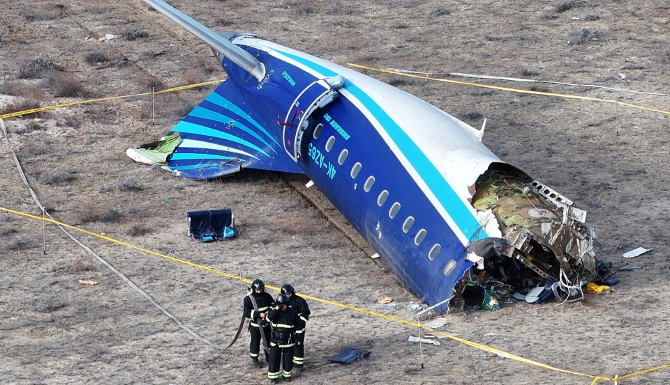 Emergency responders at the crash site of a passenger plane.
