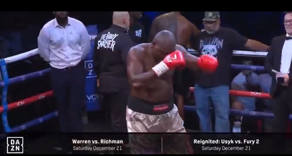 Boxer in ring, preparing to fight.