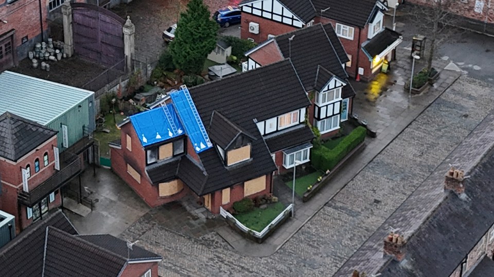 Boarded-up house after a fire on Coronation Street set.