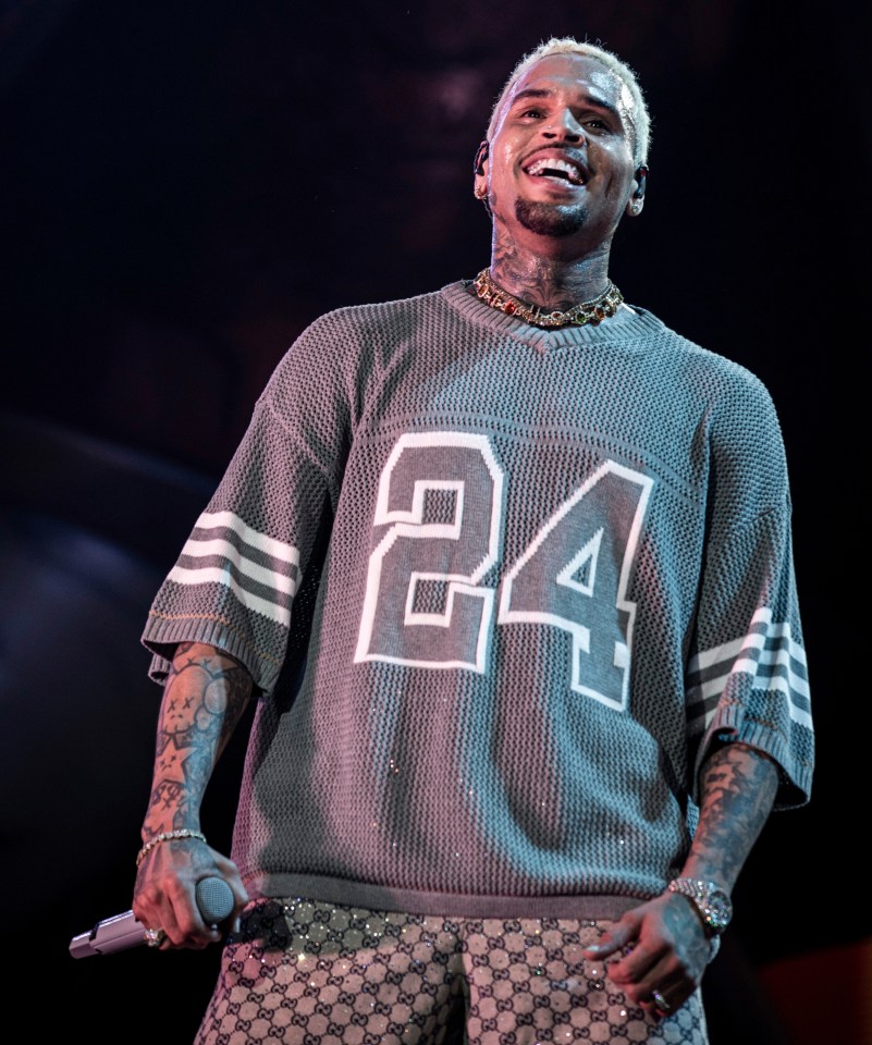 Chris Brown performing on stage.