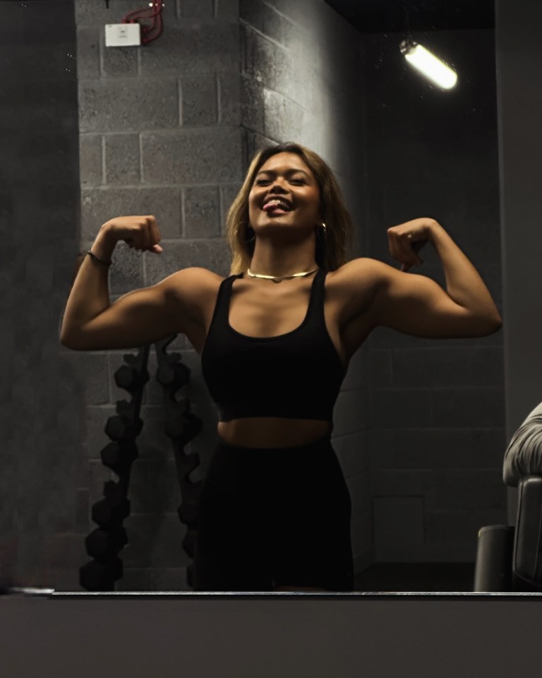 The Filipino driver lifts heavy weights as part of a gruelling training regime